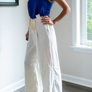 White floors length dress pants.